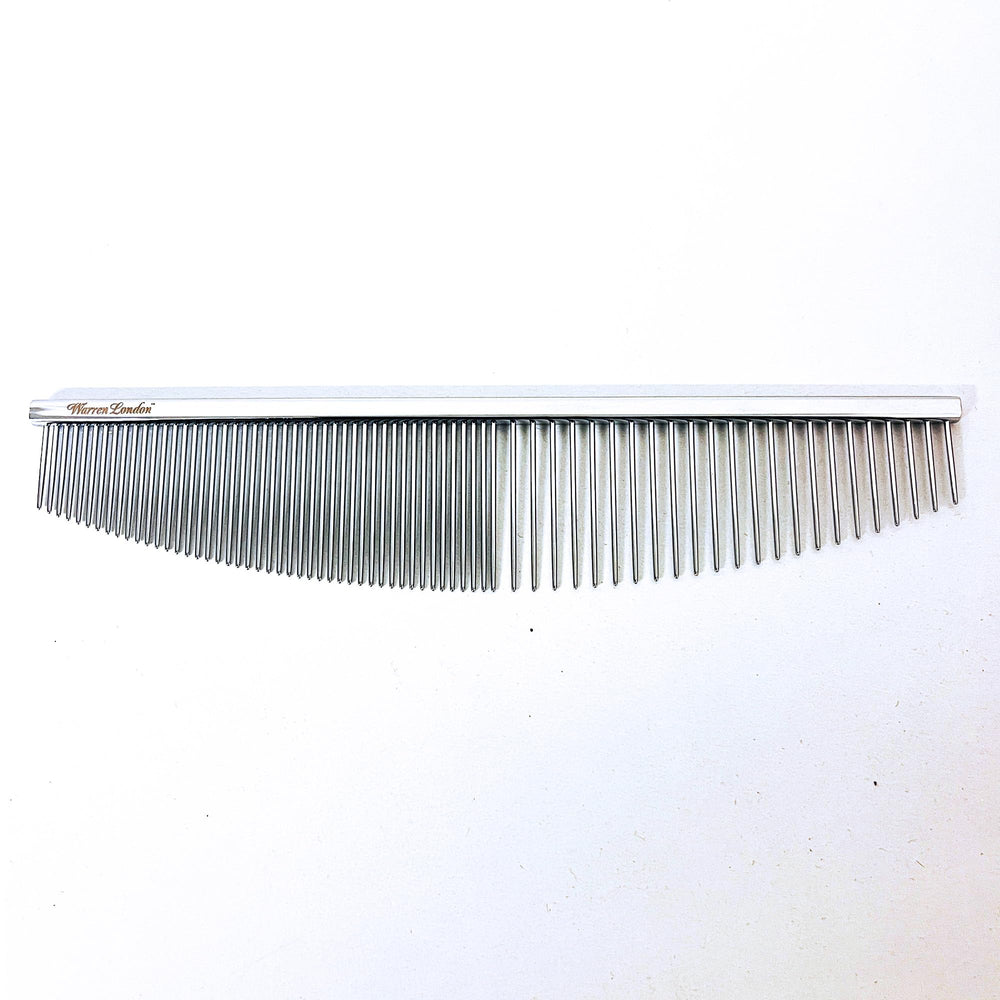 Rounded teeth reduce pulling in Warren London Copper Crescent Comb for gentle detangling.