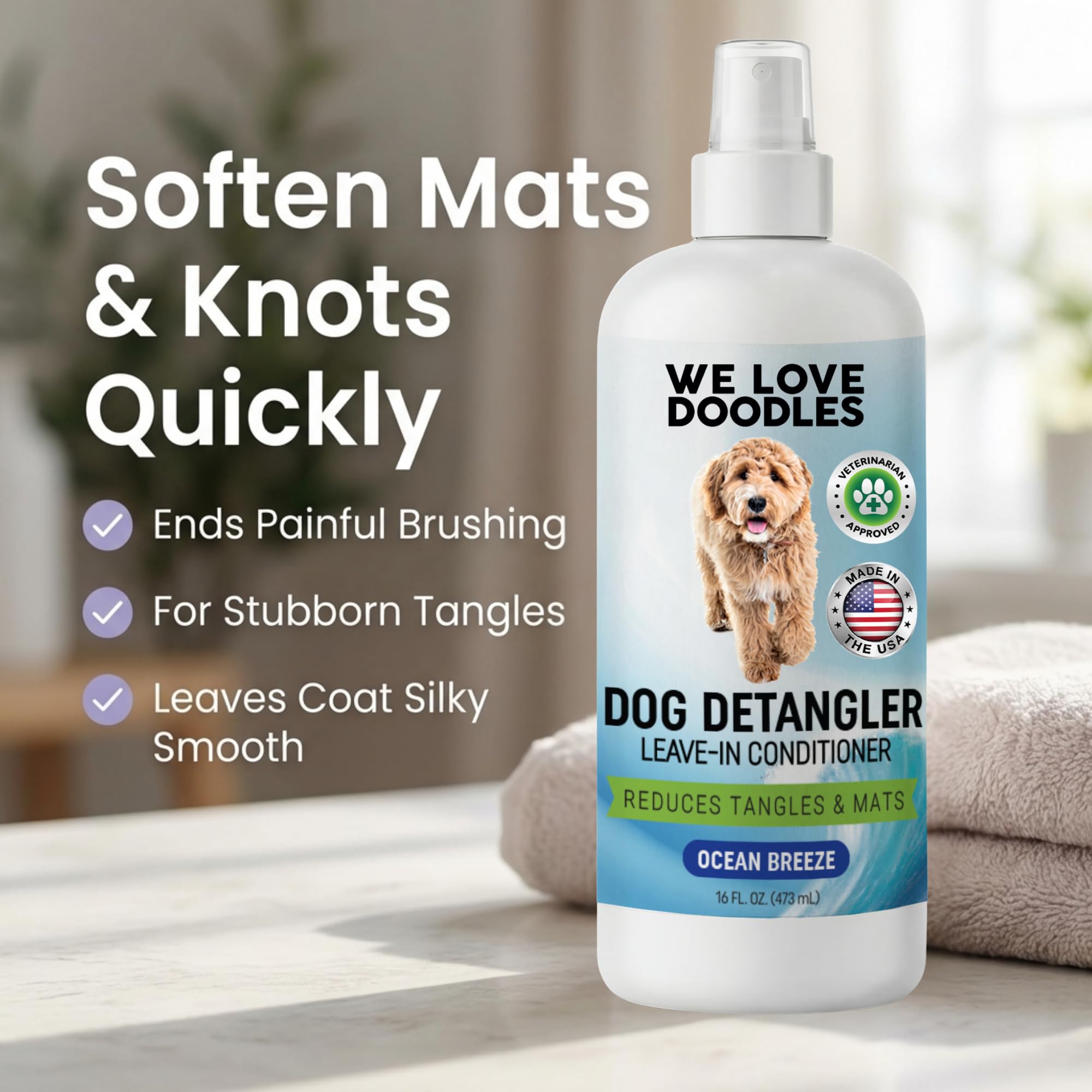 We Love Doodles Detangler Spray applied by hands for quick brushing.