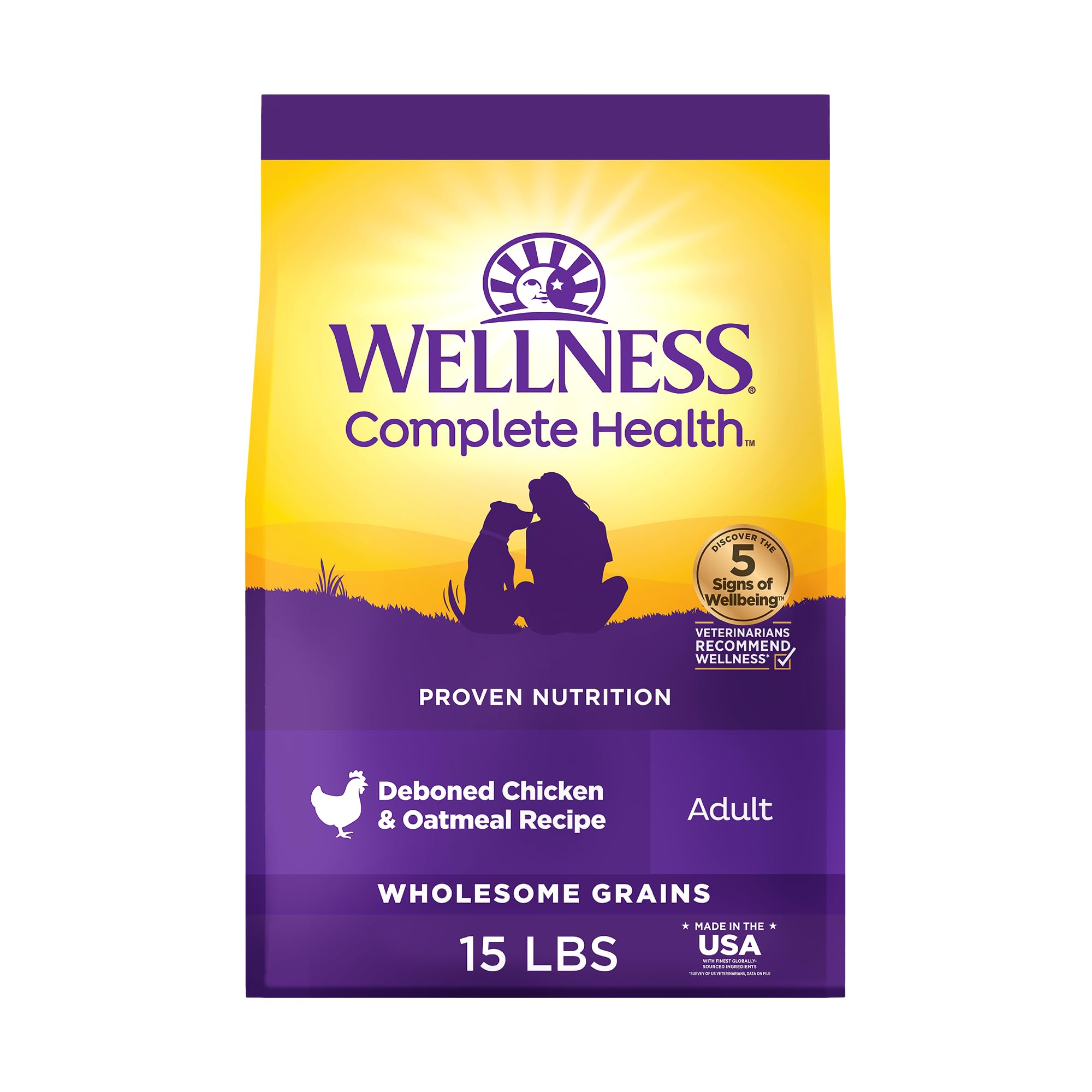 Wellness Complete Health dry dog food bag shows premium ingredients for daily nourishment.