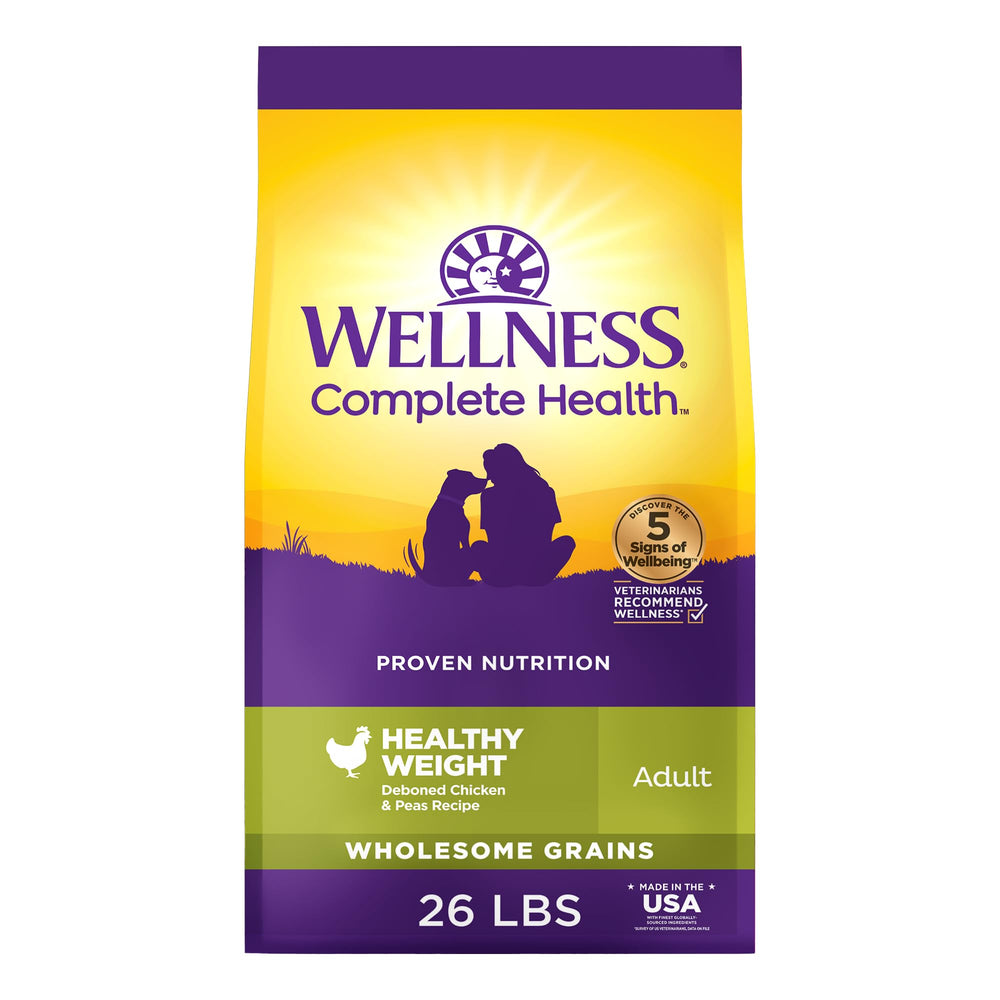 Wellness Complete Health dry dog food bag with chicken and peas for balanced nutrition