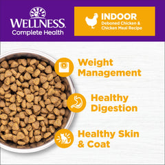 Close-up of Wellness Complete Health Indoor Chicken kibble shows hearty texture for indoor cats.