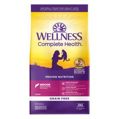 Wellness Complete Health indoor salmon herring kibble in a bowl provides grain free nutrition for indoor cats