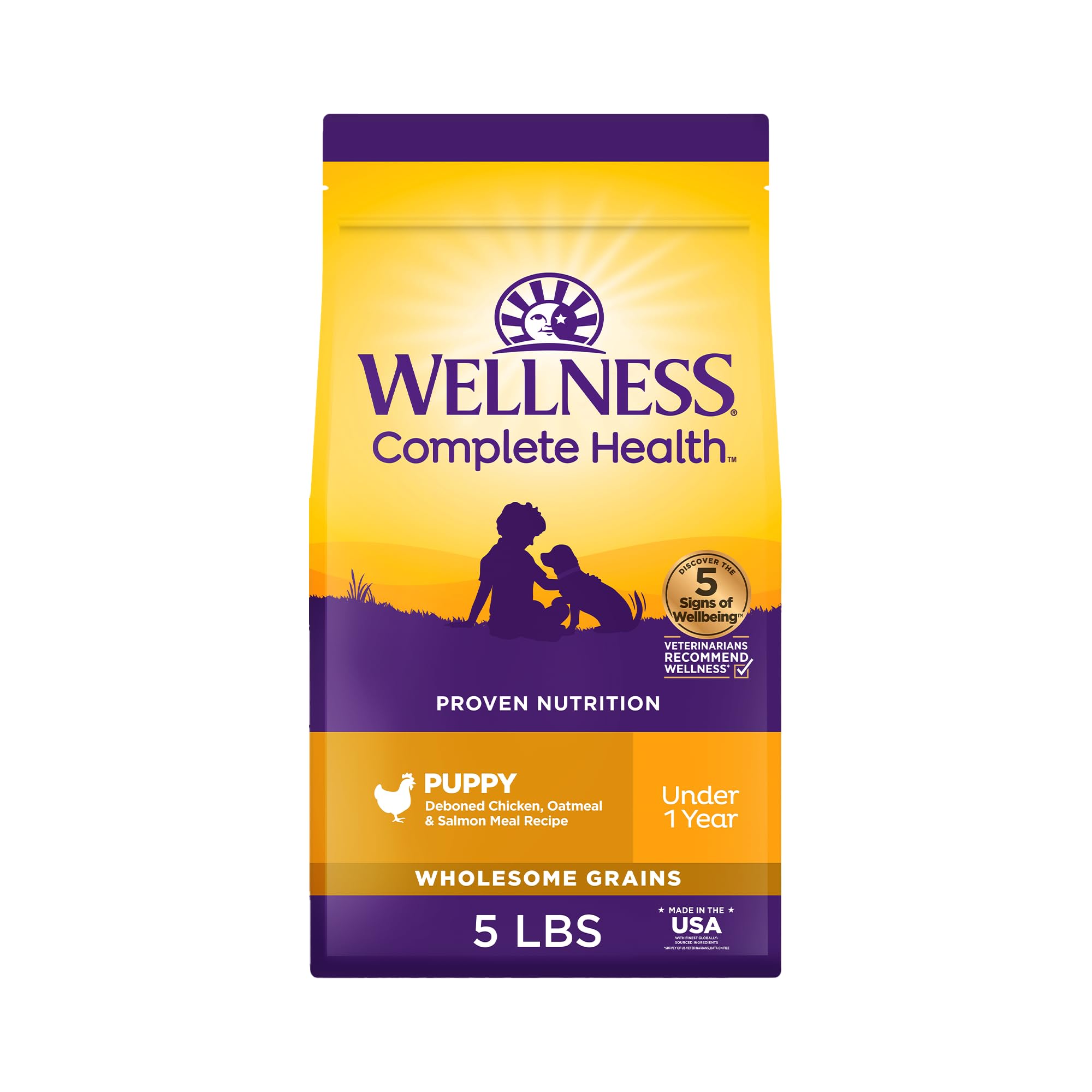 Wellness Complete Health puppy bag front showing real chicken and salmon formula.