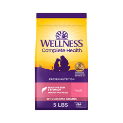 Wellness Complete Health salmon and rice kibble in a bowl supports gentle digestion