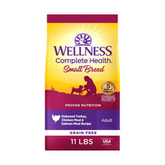 Wellness Complete Health small breed bag showing grain-free nutrition for adult dogs.