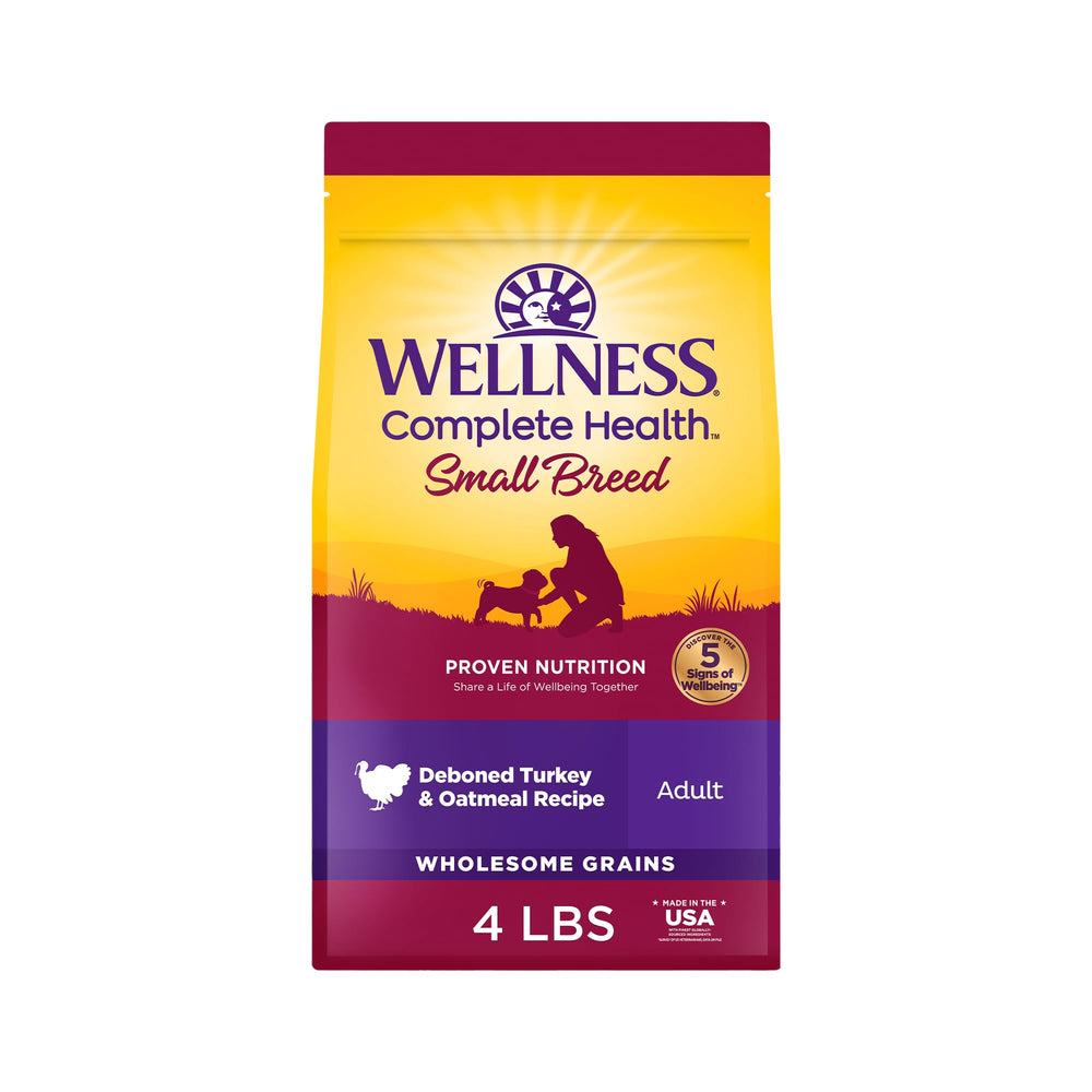Wellness Complete Health small breed kibble in a bowl for balanced daily energy.