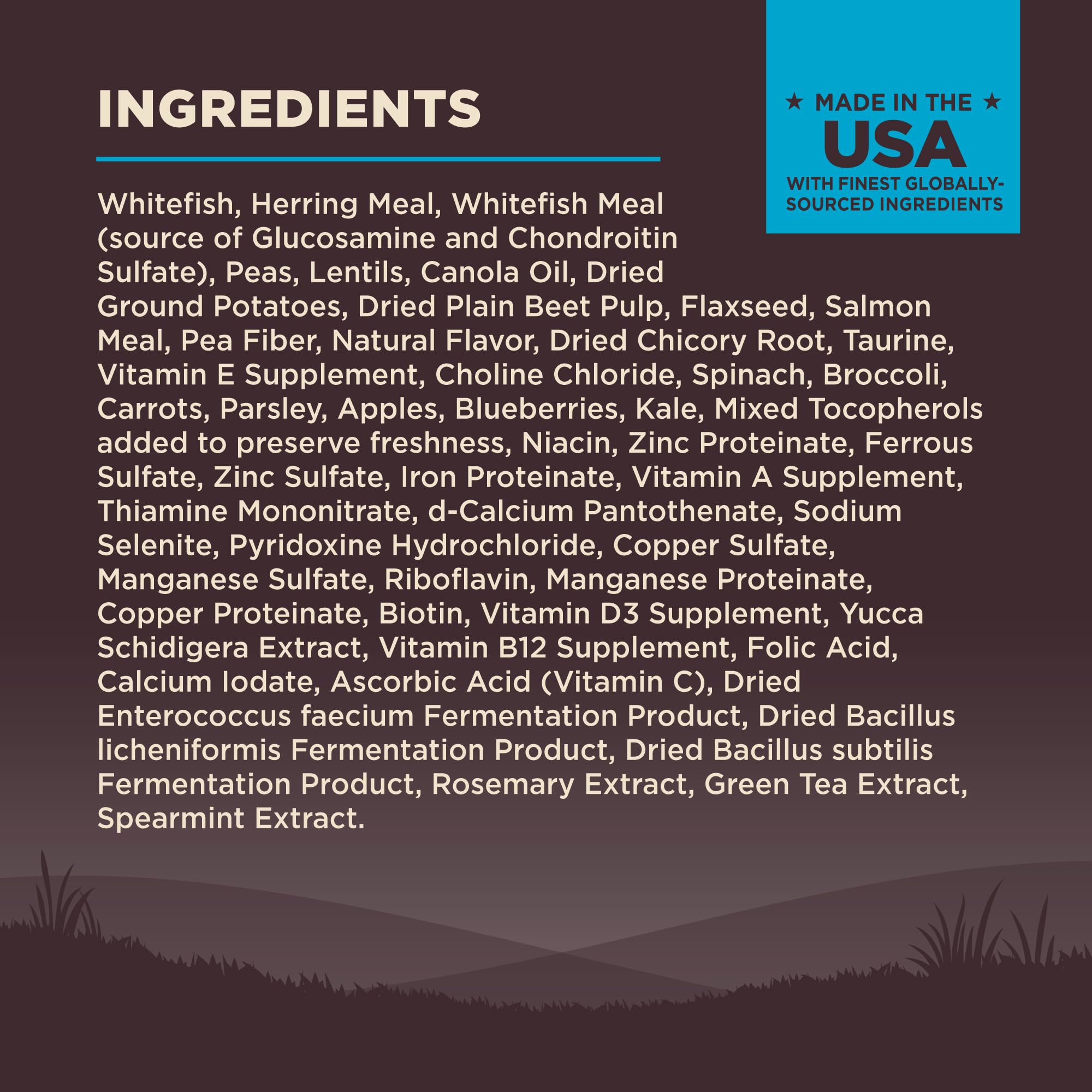 Wellness Core kibble pouring into bowl with visible fish ingredients