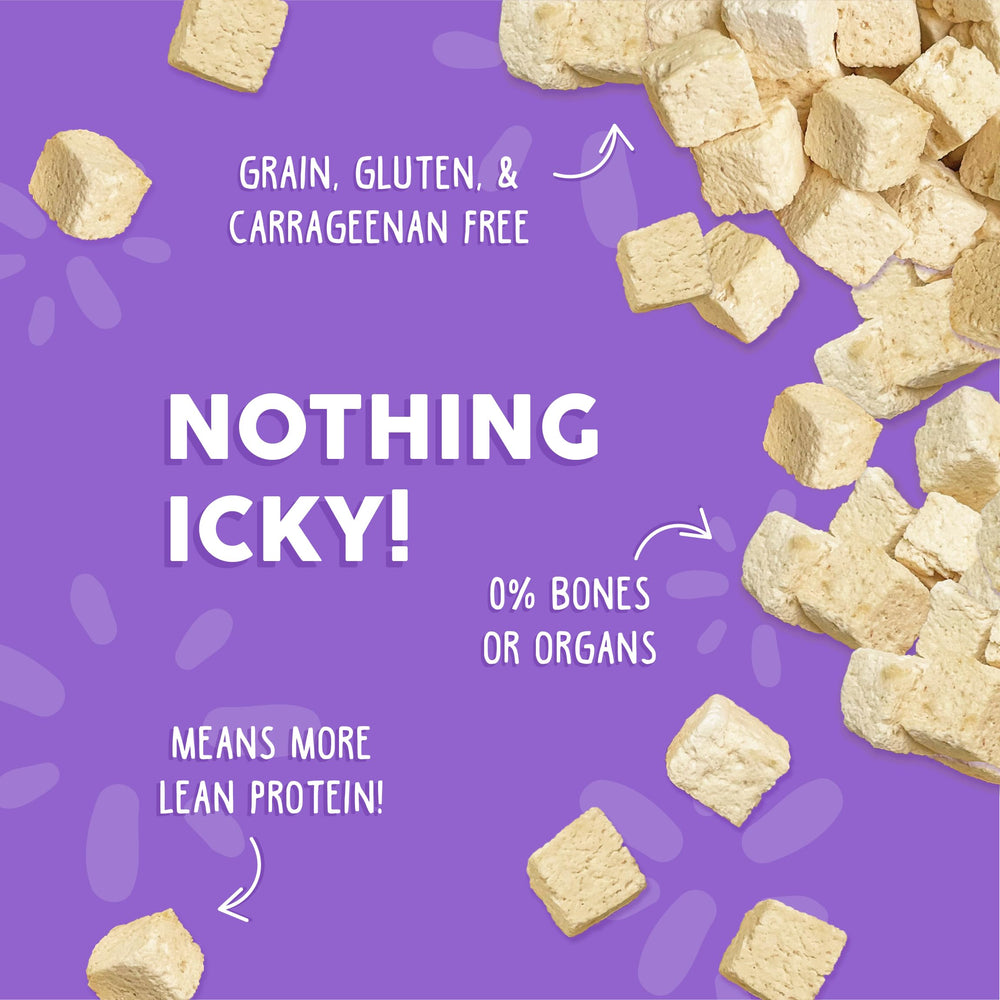 Weruva chicken cubes texture close-up to entice cats at mealtime.