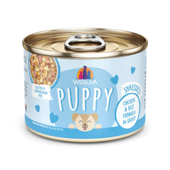 Weruva Puppy Chicken and Rice in Gravy can pack of eight displayed for convenient puppy meals.