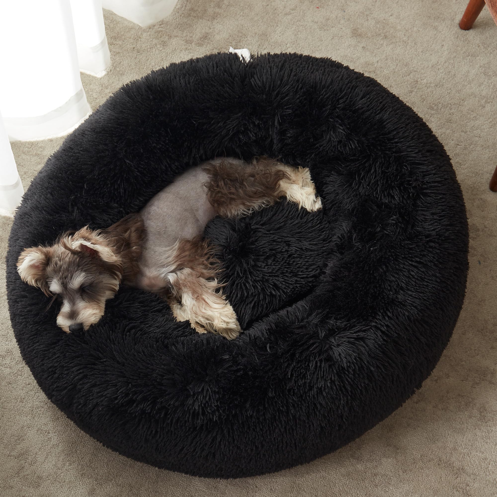 WESTERN HOME WH Calming Donut Bed faux fur close-up highlights soft texture for curling pets.