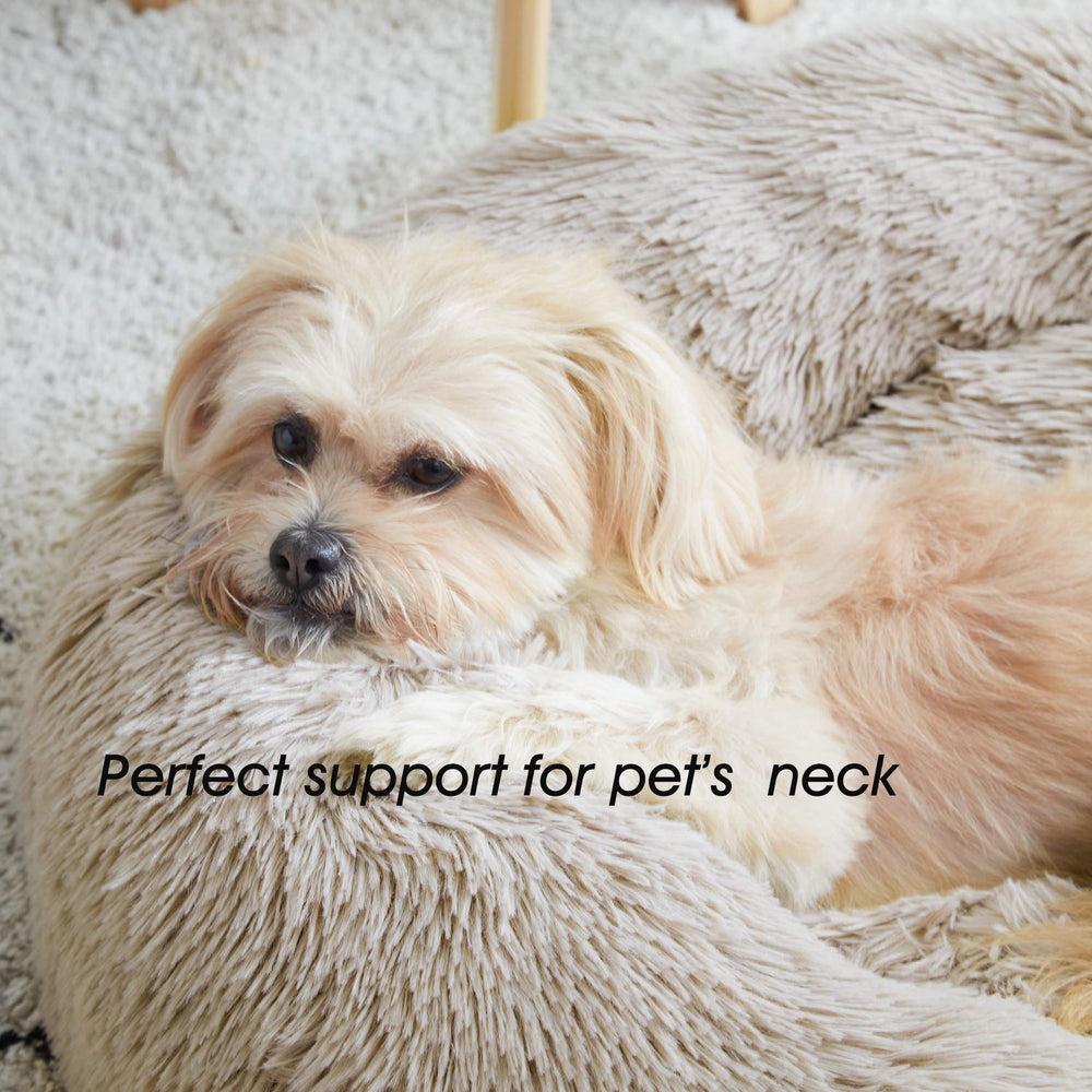 Western Home WH calming donut bed in a room shows versatile placement in homes.