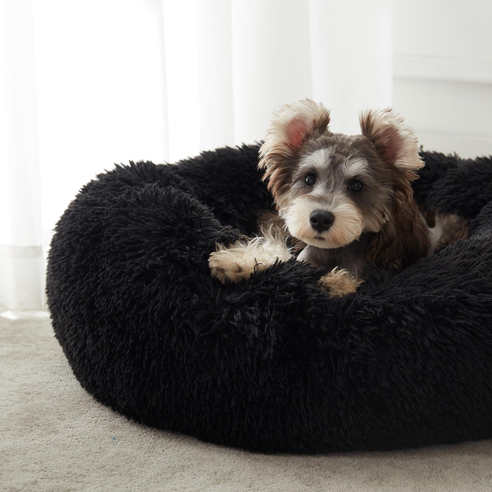 WESTERN HOME WH Calming Donut Bed interior padding provides cushioned support for joints.