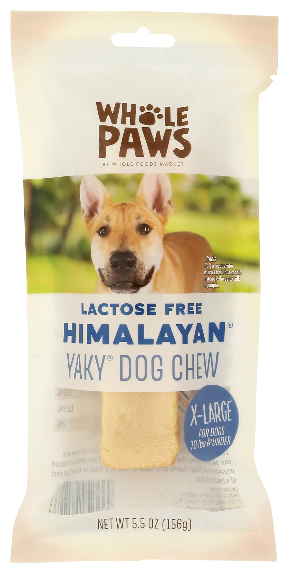Whole Paws Himalayan Yaky Dog Chew in hand, lactose- and grain-free, promotes focused chewing.