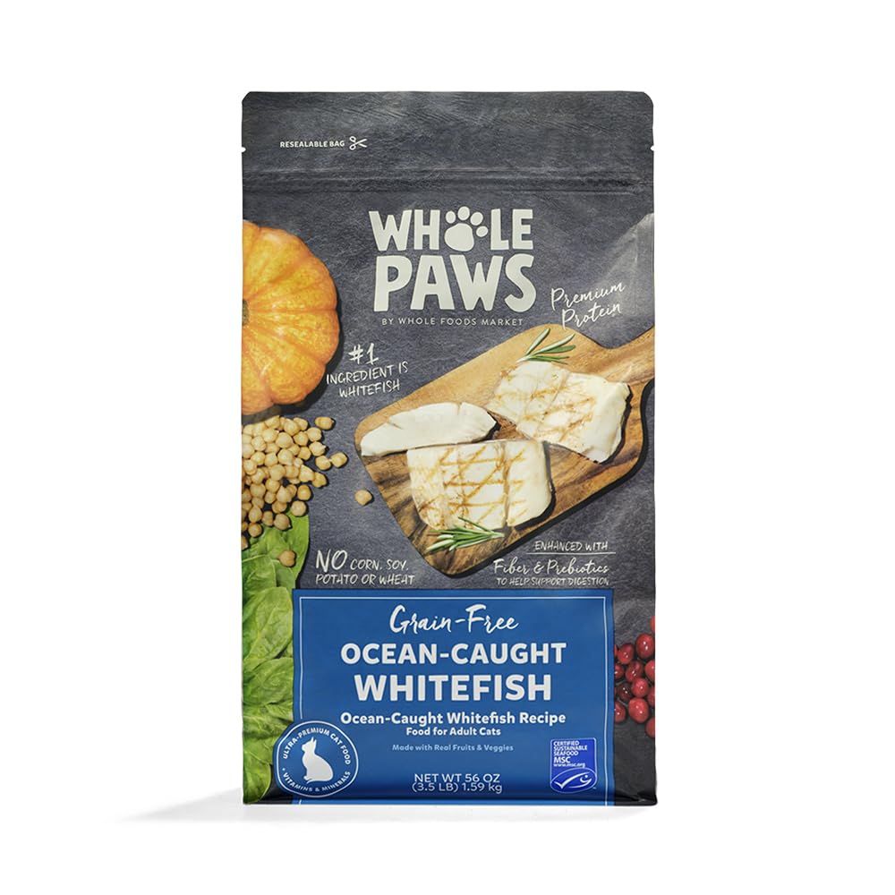 Whole Paws Ocean-Caught Whitefish Recipe kibble spilling from bag, premium grain-free nutrition.