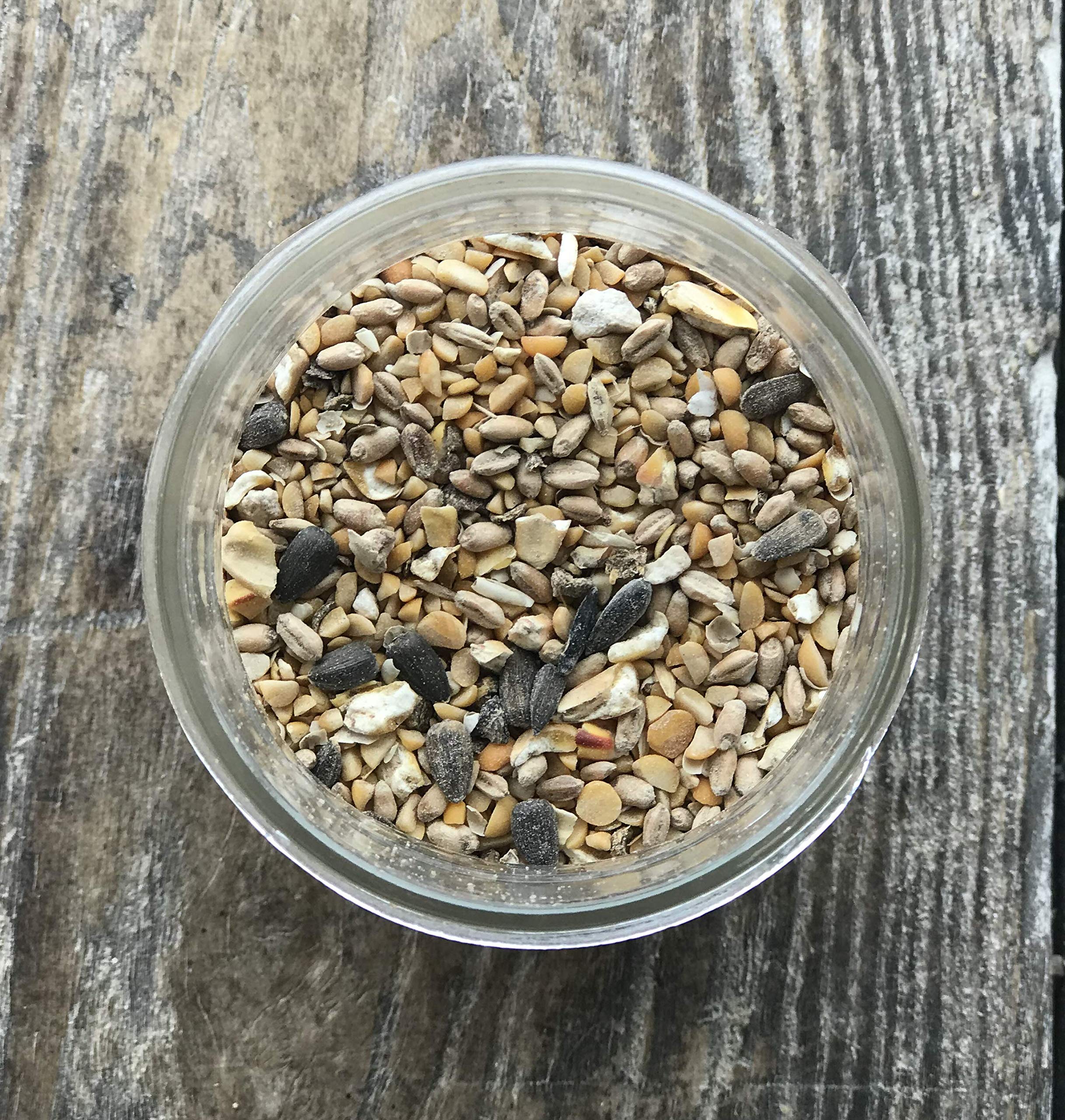 Wholesome Harvest layer blend grain mix shows cracked grains for balanced nutrition.