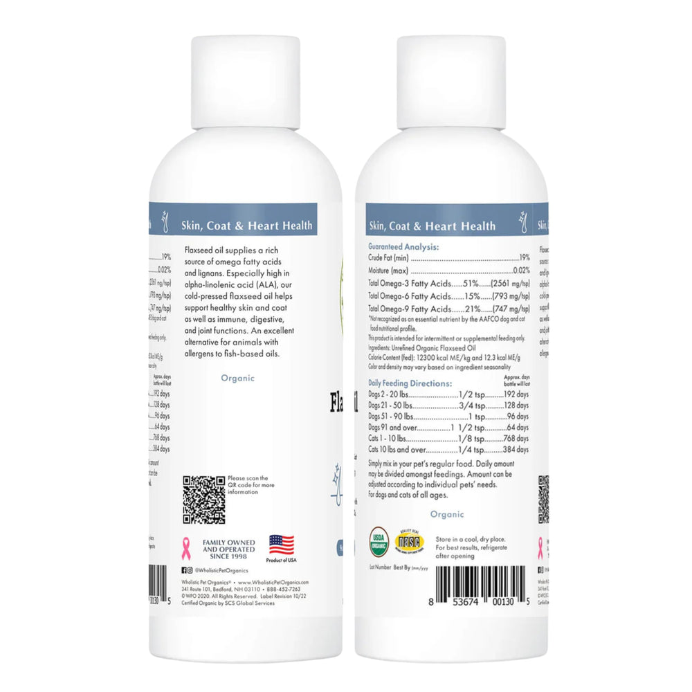 Wholistic Pet Organics flaxseed oil bottle on a pet care mat.