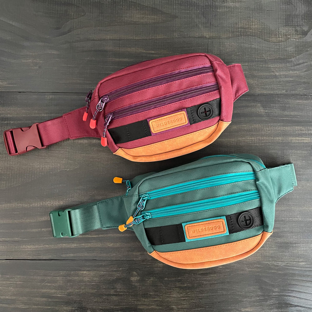 Wilderdog pack shows three pockets for organizing treats, keys, and balls