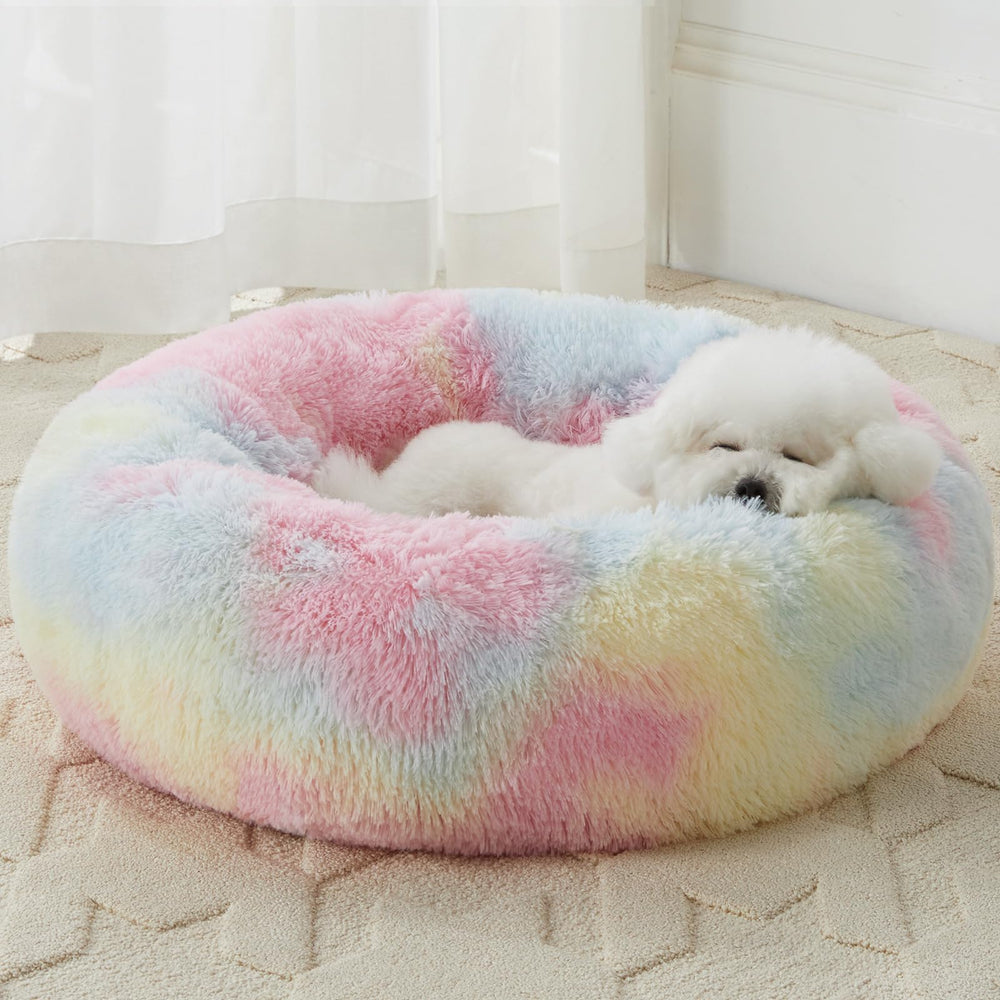 WNPETHOME calming donut dog bed with rainbow faux fur for cozy naps.