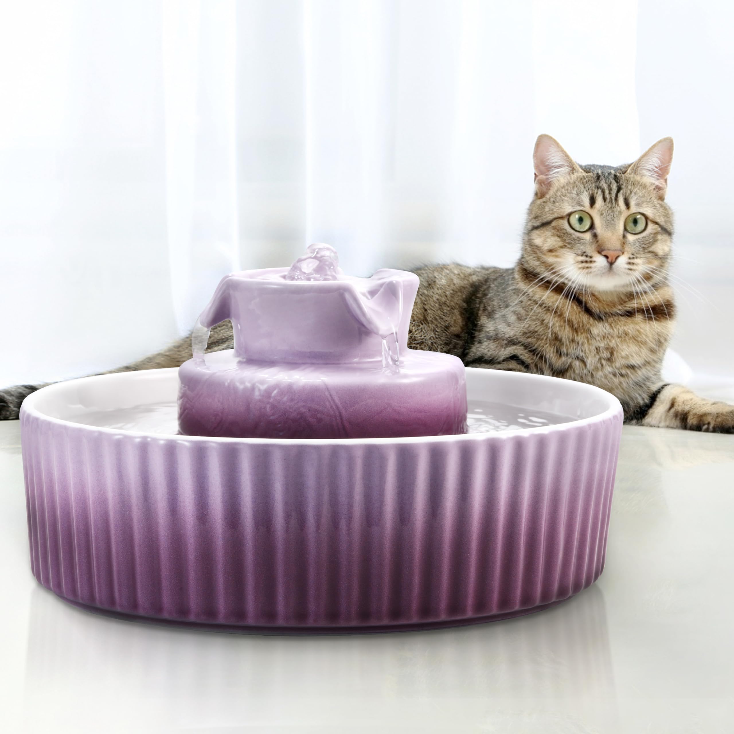 Wonder Creature Cupcake Cat Fountain purple-color finish complements modern interiors.