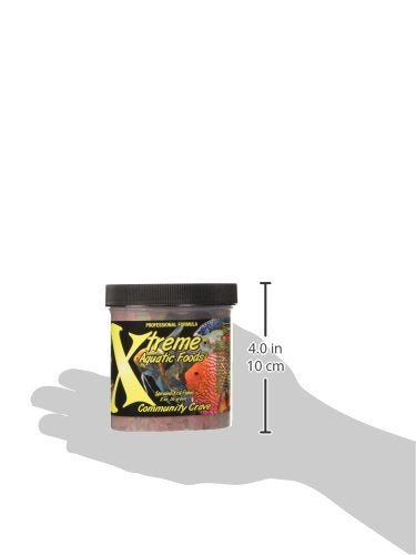 Xtreme Aquatic Foods Community Crave flakes dissolving to keep water clear.