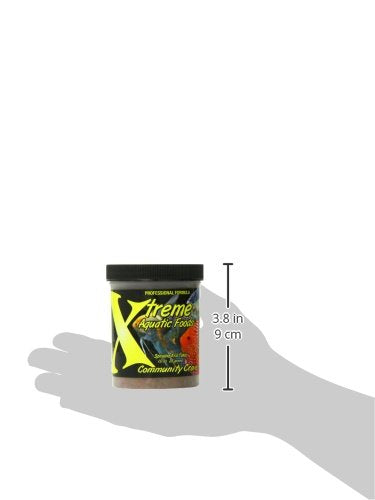 Xtreme Aquatic Foods flakes dissolving in water indicate cleaner feeding.