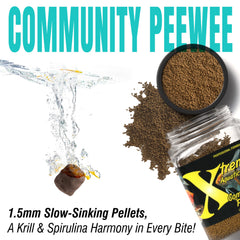 Xtreme Aquatic Foods PeeWee pellets being fed in a community tank.