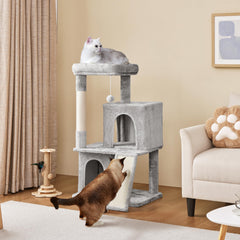Yaheetech plush condo on cat tree offering a cozy hideaway