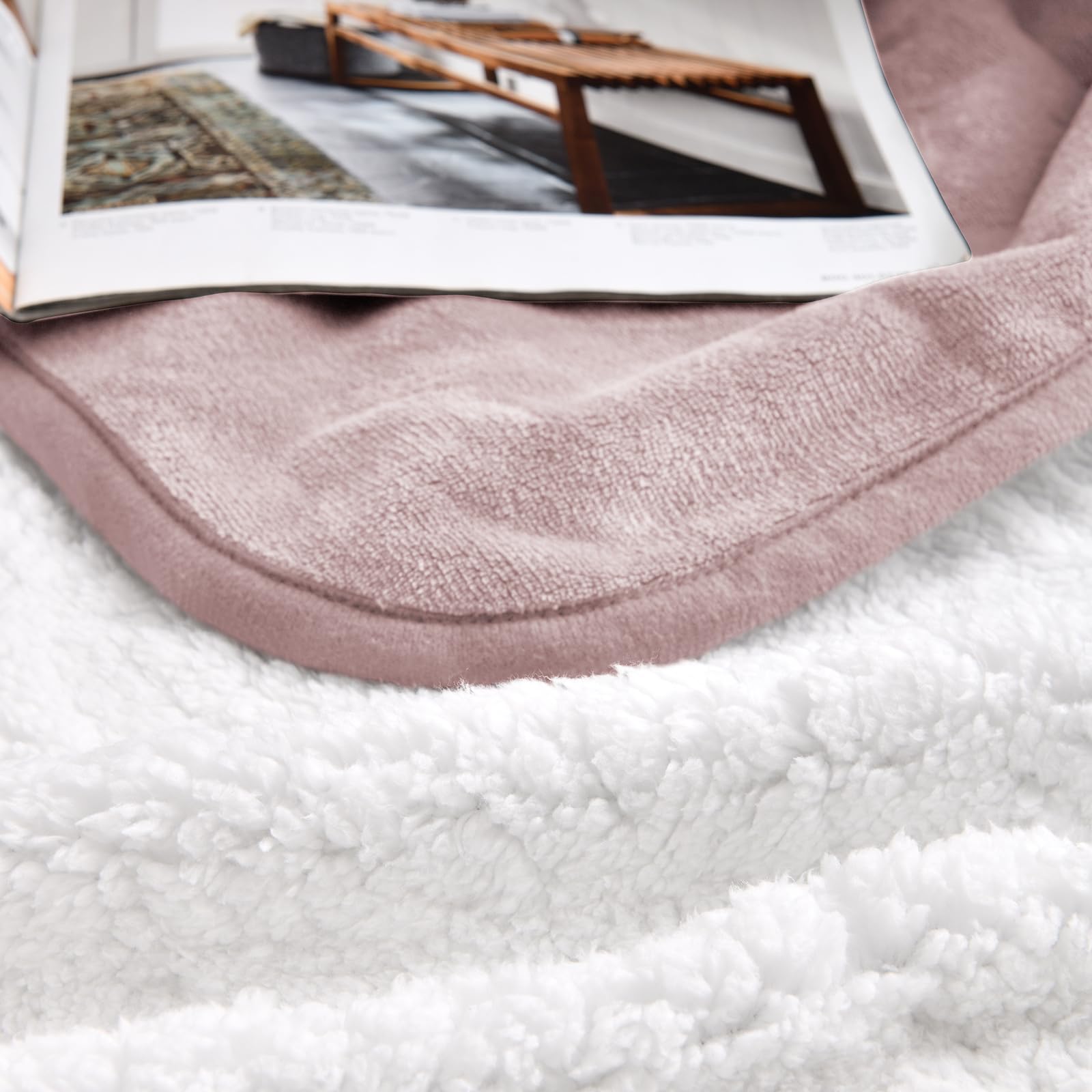 Yaning dusty-pink blanket adds stylish protection to furniture