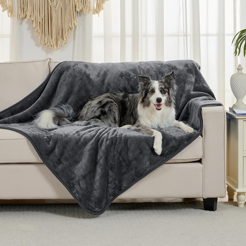 Yaning reversible sherpa and flannel blanket offers cozy warmth for pets and people
