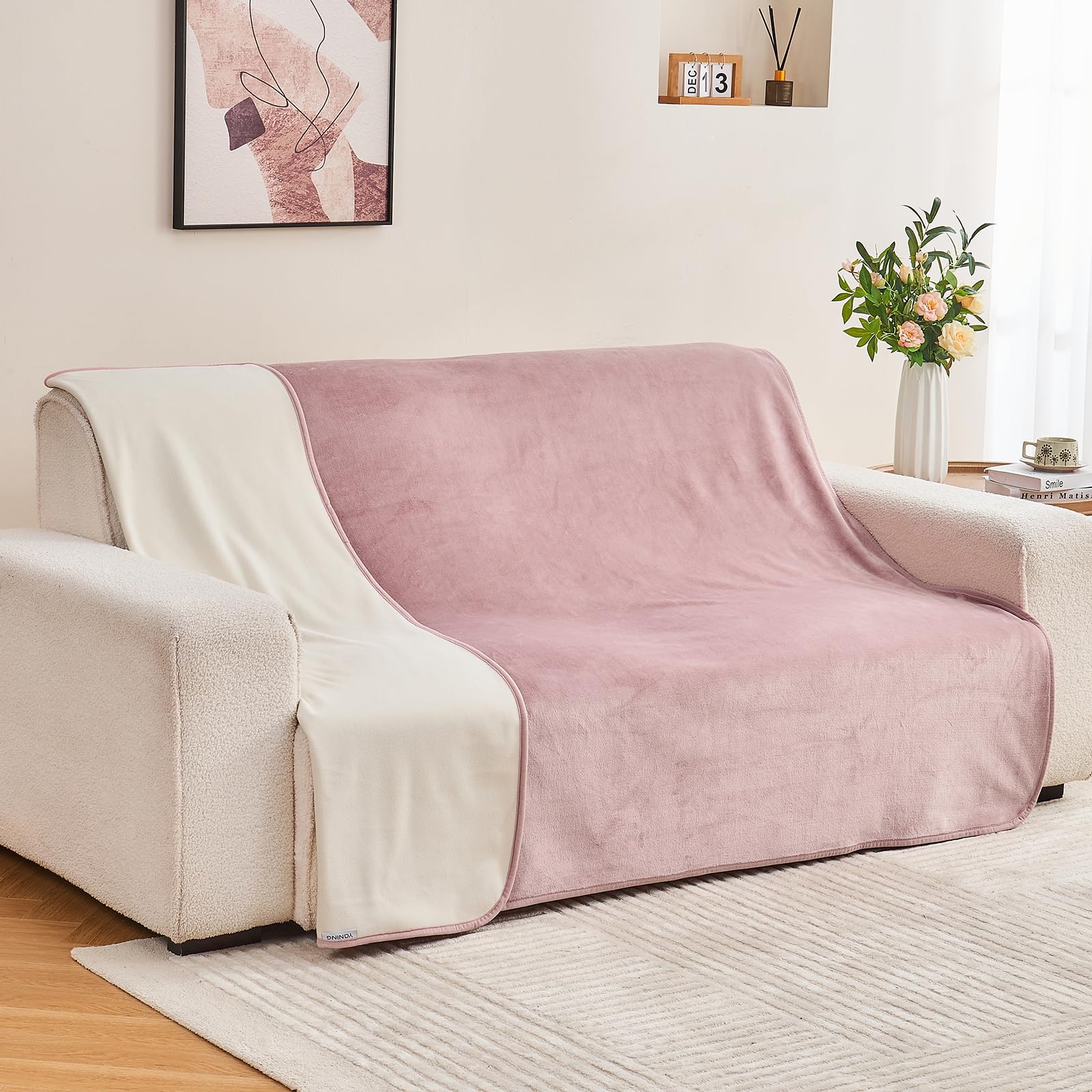 Yaning Blanket dusty pink off white variant complements room decor