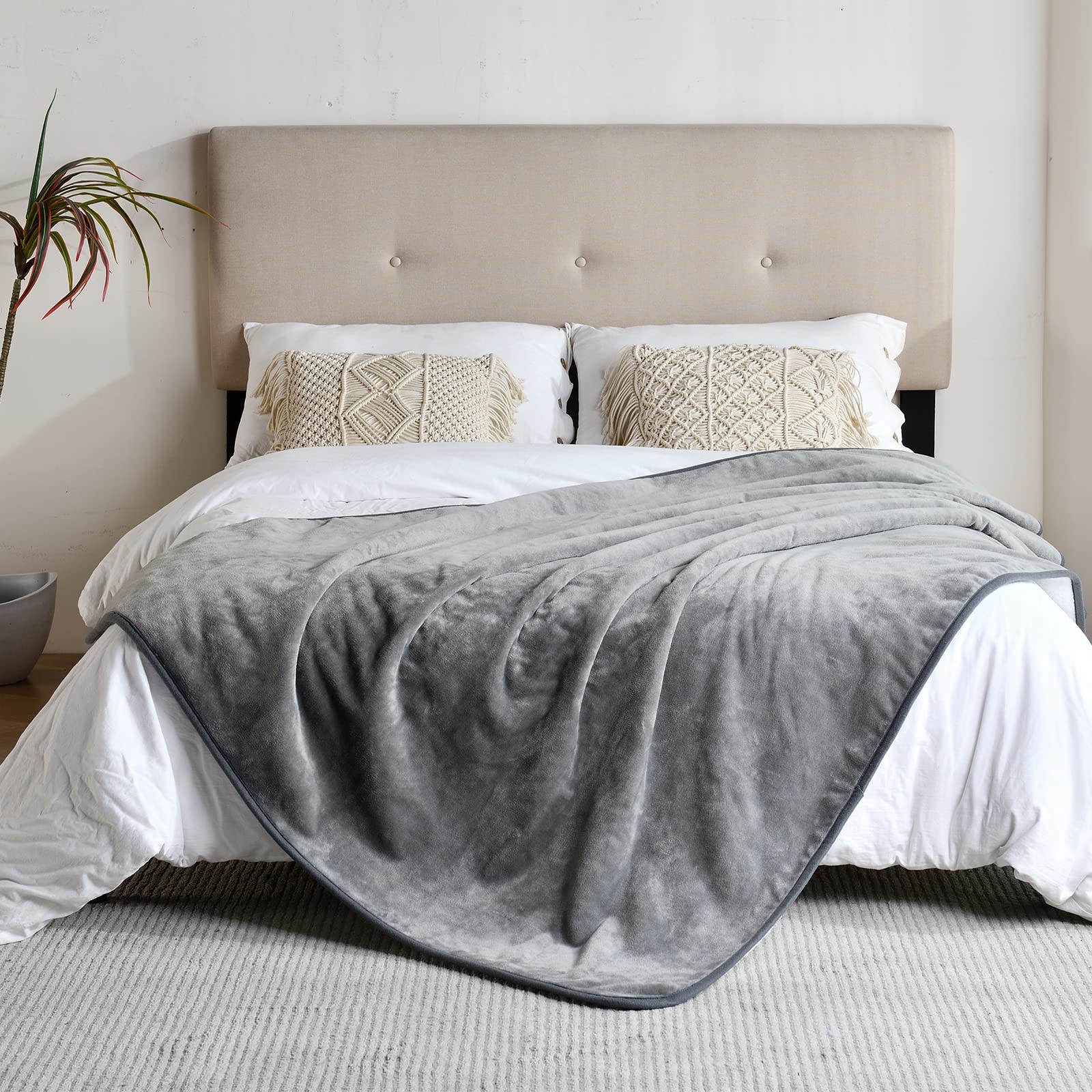 Yaning blanket showing internal waterproof coating to prevent leaks.