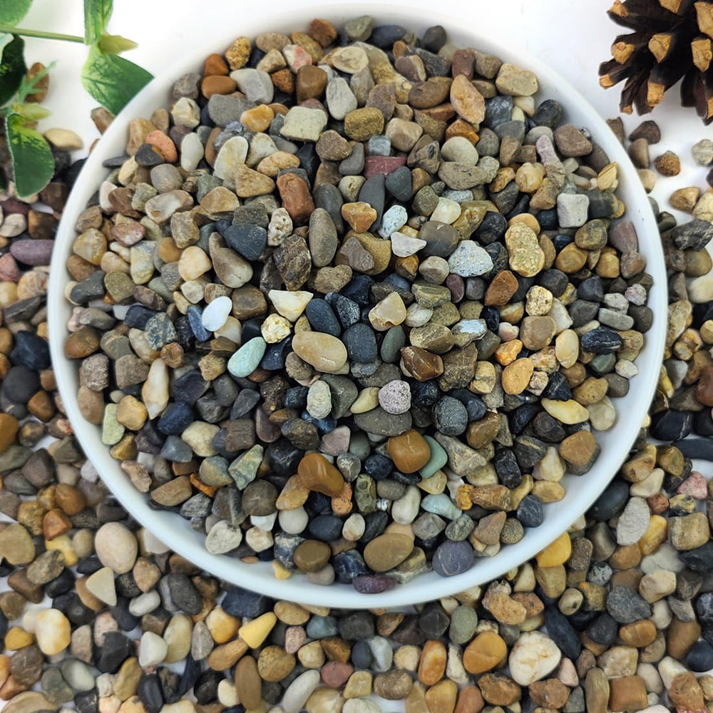 YISZM river rocks aquarium gravel enhances tank aesthetics with a natural, safe finish.