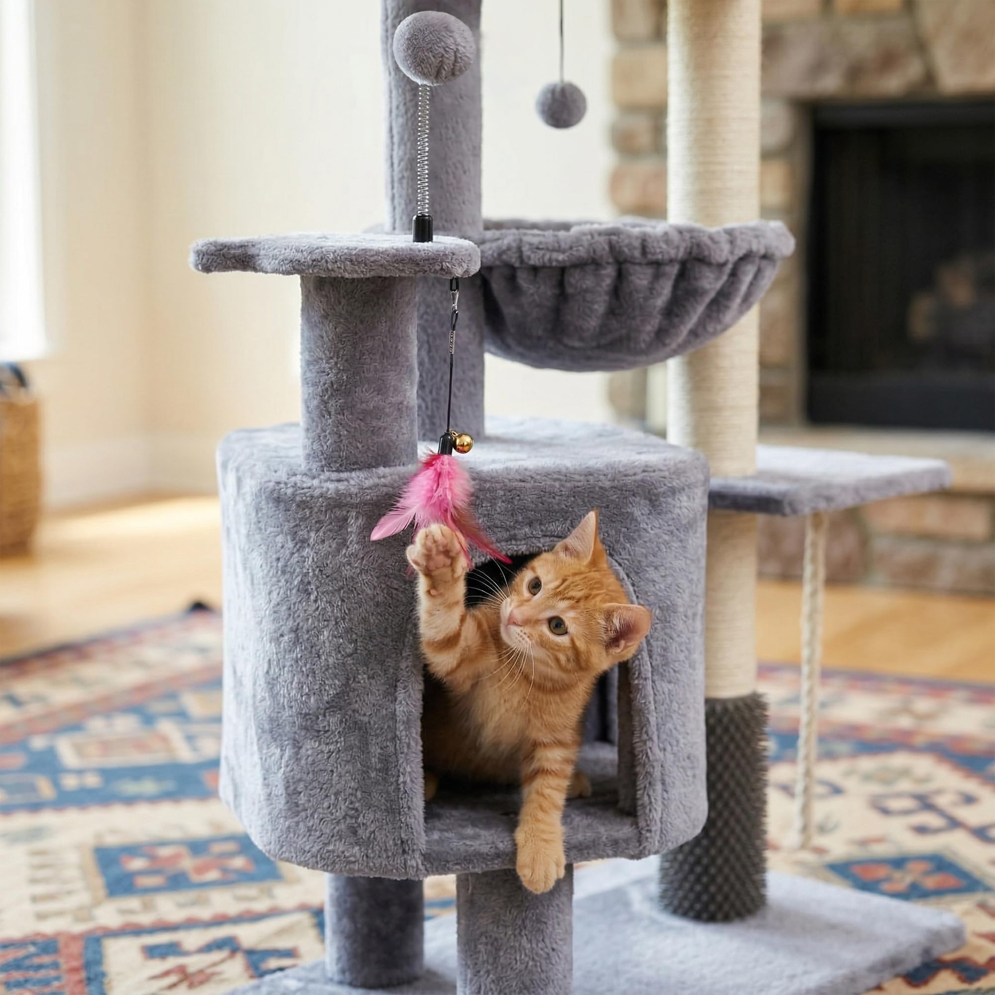 YOUPETSER cat tree plush-hideaway provides a soft retreat after play.