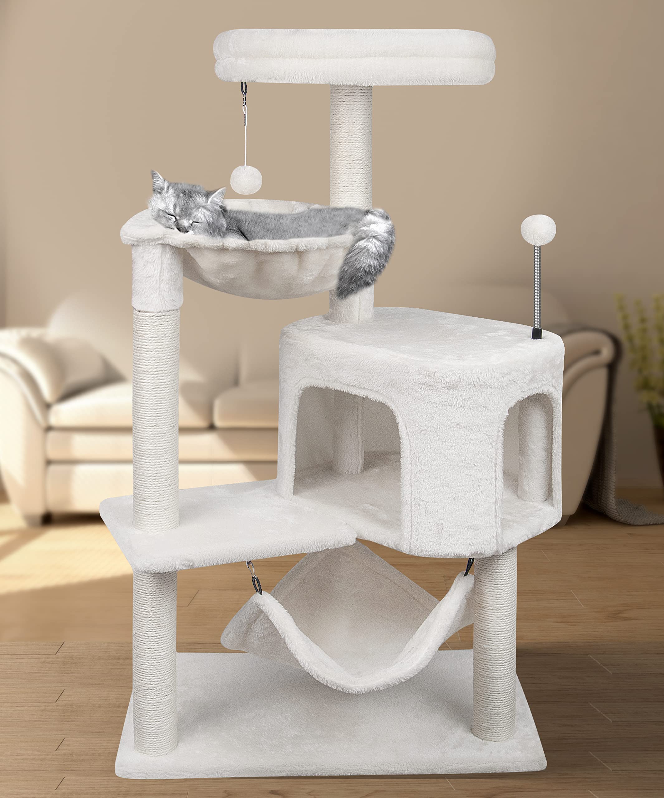 YUNIQUE cat tree with sisal posts resists scratching during play.