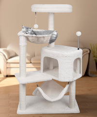 YUNIQUE cat tree with sisal posts resists scratching during play.