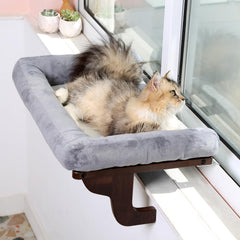 Zakkart cat window perch with bolster provides a cozy elevated view for curious cats.