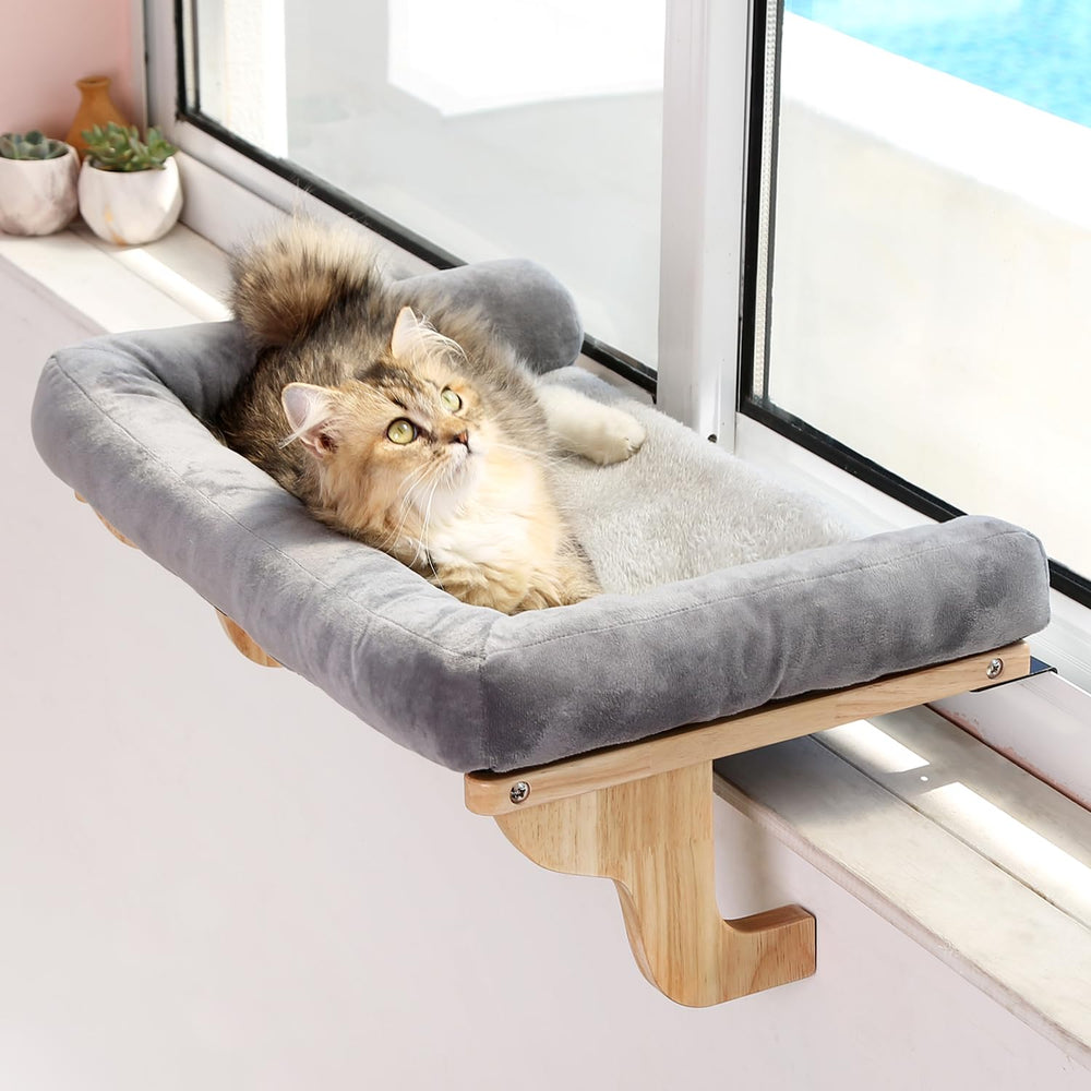 Zakkart cat window perch bolstered by a wood frame for a cozy elevated view.