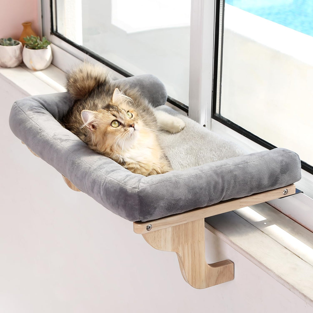 Zakkart cat window perch with bolster on wood frame for sunny naps.