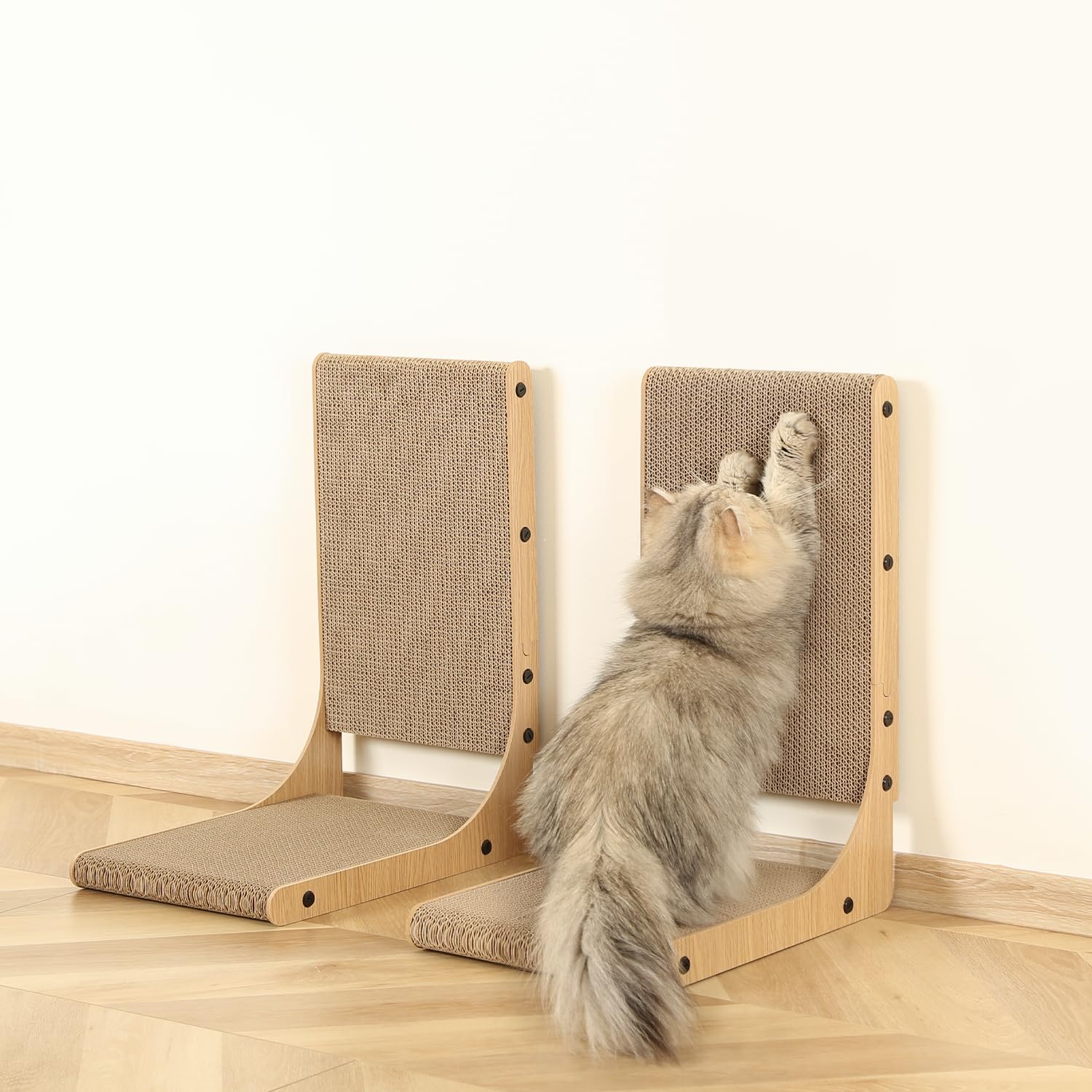 Zakkart two-pack in living room with two cats using scratchers.