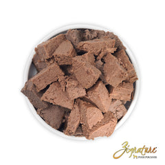 Zignature pork wet dog food close-up of texture highlights digestible protein for sensitive dogs.
