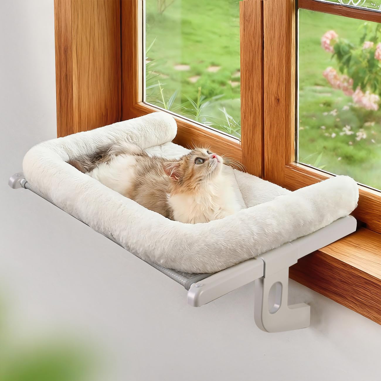 Zoratoo cat window sill perch with large bolster for cuddling and naps.