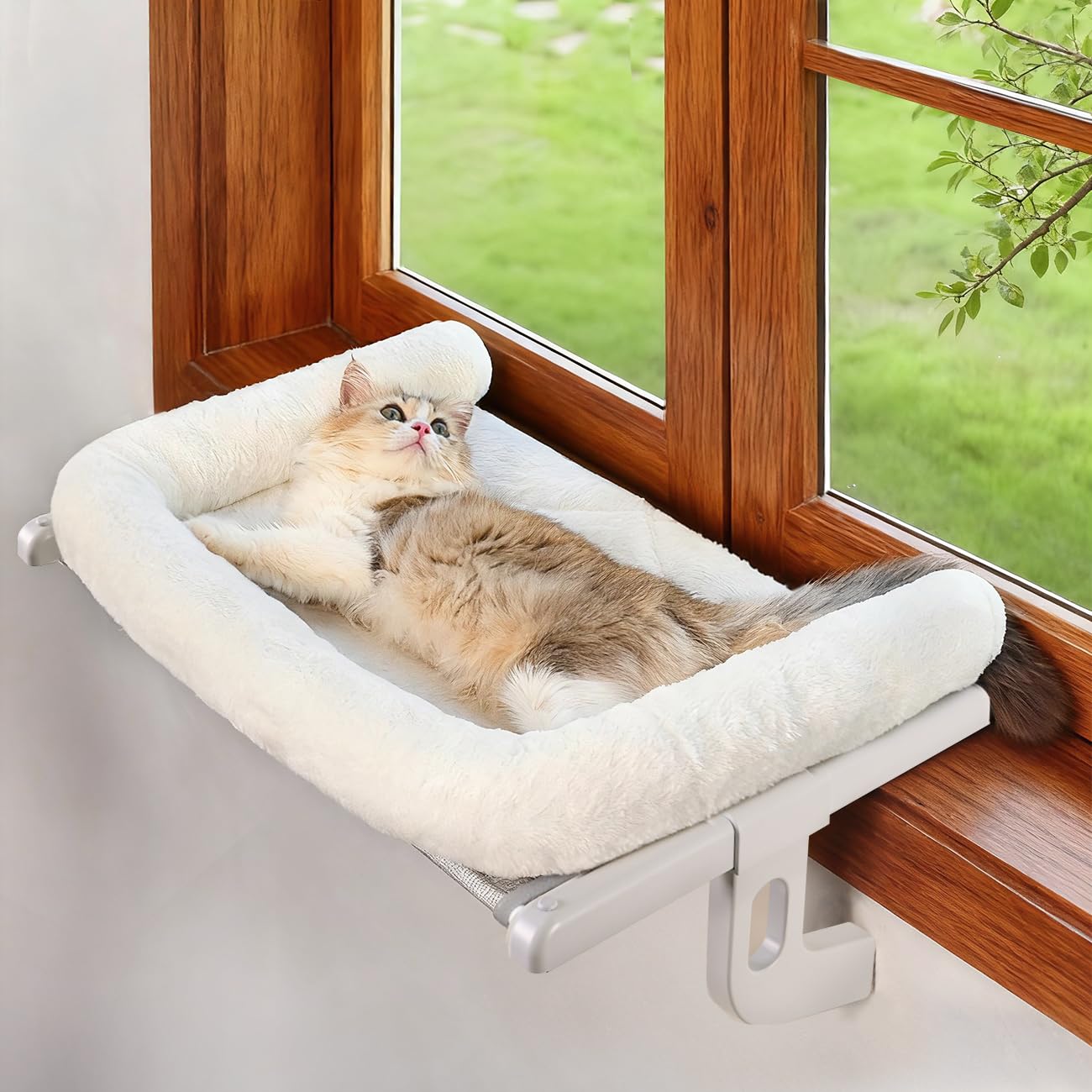 Zoratoo cat window-sill perch with large bolster provides cozy snuggling.