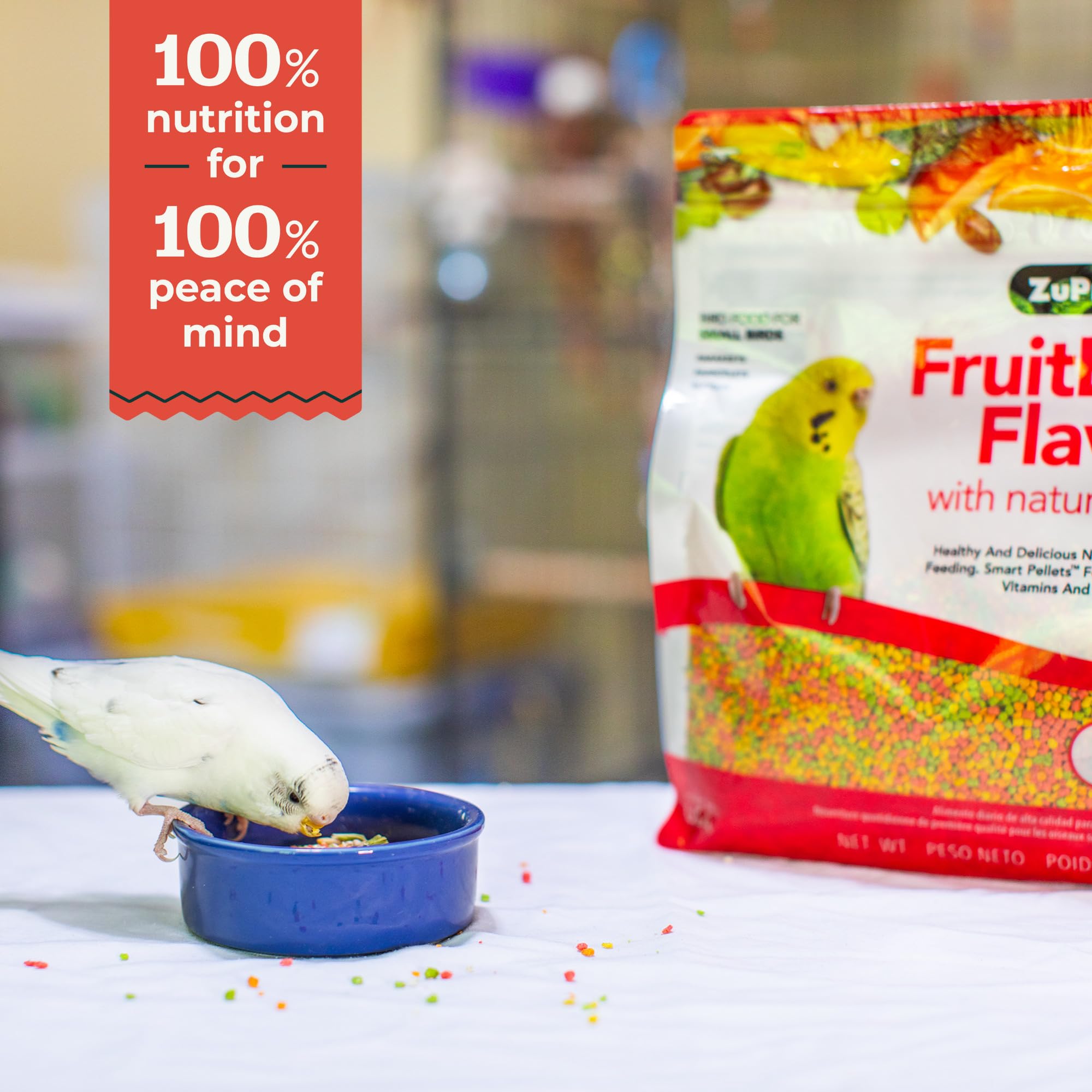 Close-up of colorful FruitBlend pellets highlighting real fruit pieces for appealing texture.
