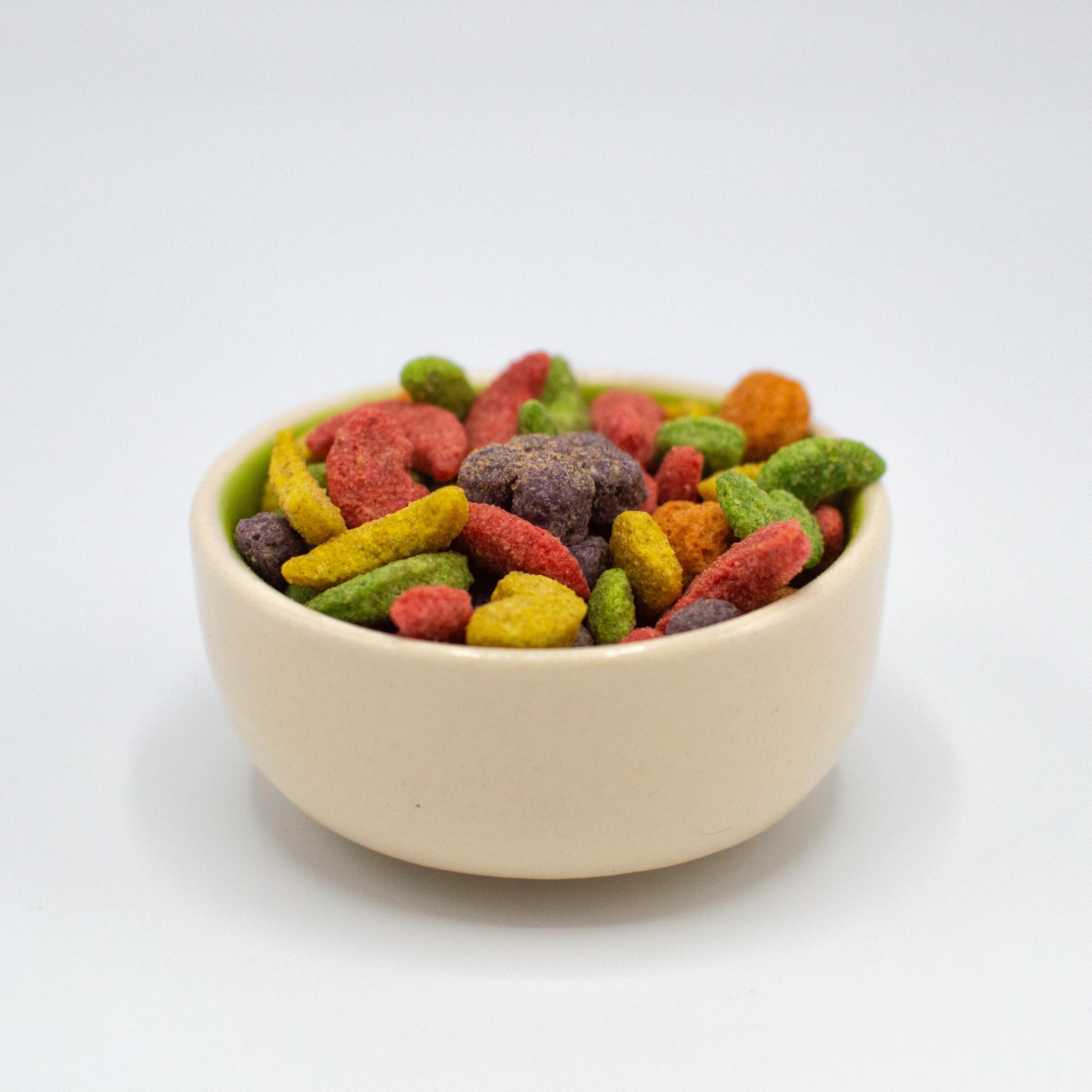 Bird enjoys FruitBlend with fresh fruits for diverse flavors and textures